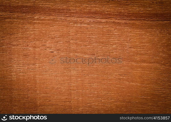 Old stained board. A dark background