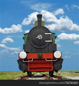 old steam engine locomotive train with beautiful sky background