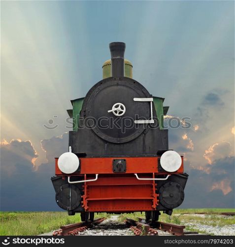 old steam engine locomotive train with beautiful sunbeam background