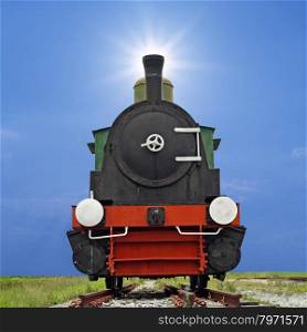 old steam engine locomotive train with beautiful sunlight background