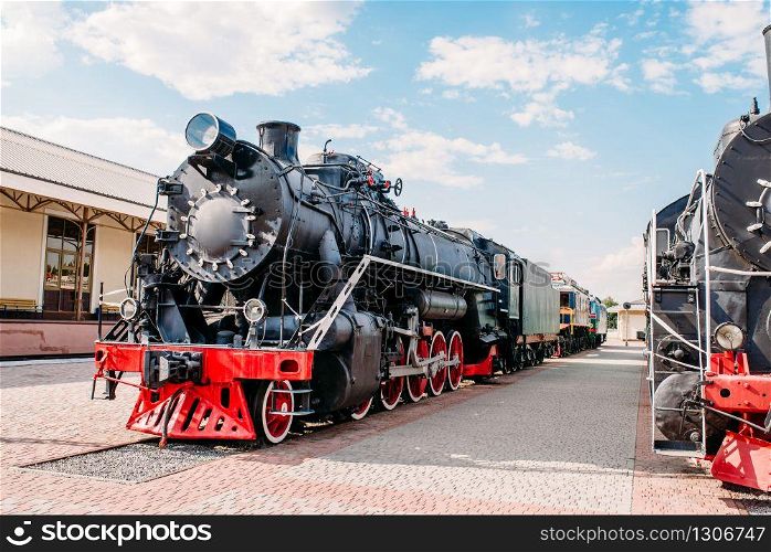 Old steam train, vintage locomotive. Railway engine, ancient railroad vehicle