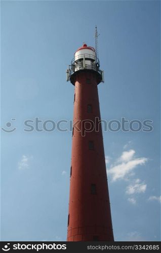 Old steel lighthouse near the harbour of IJmuiden, the Netherlands