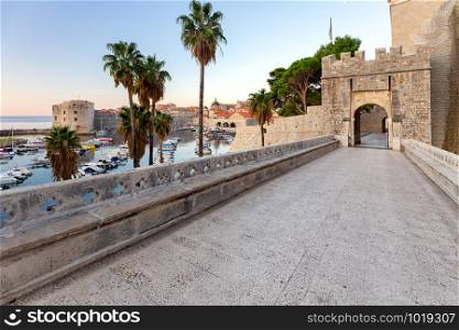 Old stone city gate and suspension bridge. Dubrovnik. Croatia.. Dubrovnik. Old city gate.