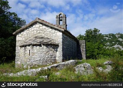 Old stone orthodox church near Skadar lake in Monenegro
