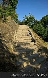 old stone stairway on the hill