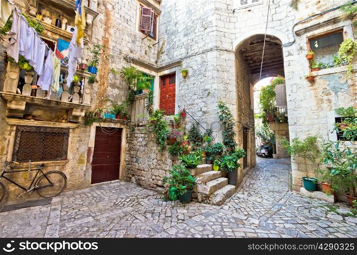 Old stone street of Trogir UNESCO world heritage town in Dalmatia, Croatia
