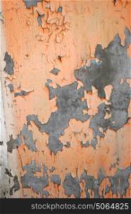 Old stone wall background. Obsolete color paint backdrop.. Old stone wall background. Obsolete orange color paint backdrop.