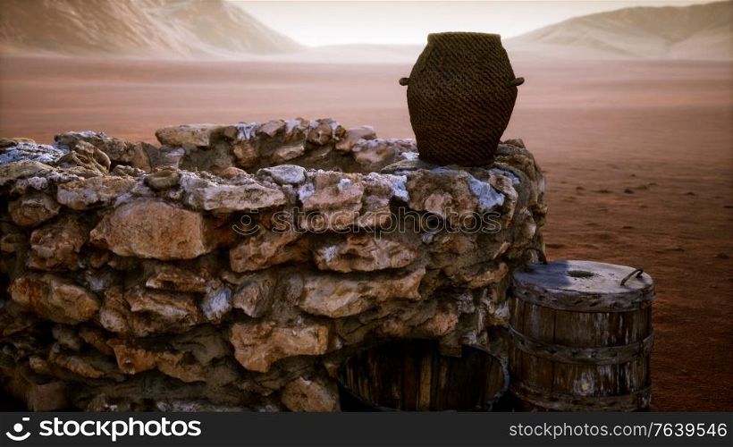 old stone water well in the desert