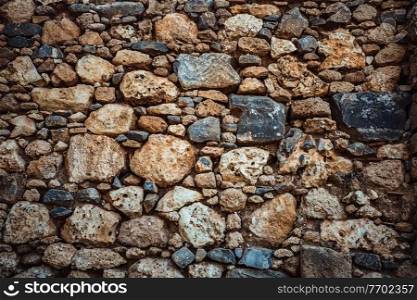 Old stony wall, abstract vintage brick background, no people, beautiful brown rocks wallpaper
