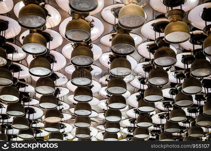 Old storm lanterns hang under the ceiling