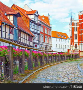 Old street along small river in Quedlinburg, Germany