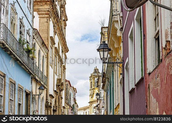 Old street and aged houses facades in historic Pelourinho district in Salvador, Bahia. Old street and aged houses facades in historic Pelourinho distric