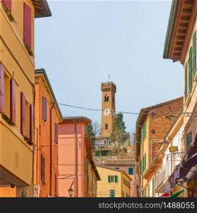 Old street and bell tower in Santarcangelo di Romagna town, Emilia-Romagna, Italy