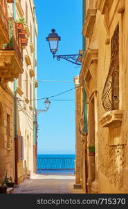 Old street by the sea in Syracuse, Sicily Island, Italy