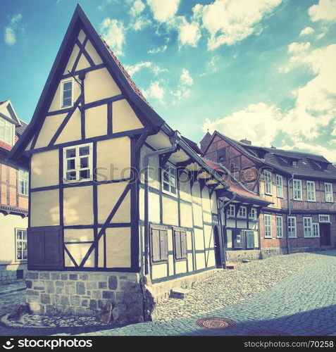 Old street in Quedlinburg, Germany. Retro style filtred image