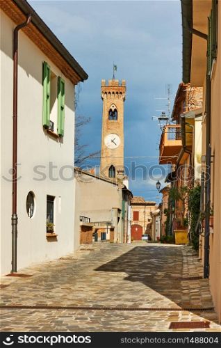 Old street with bell tower in Santarcangelo di Romagna town, Emilia-Romagna, Italy