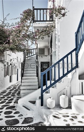 Old street with whitewashed houses in Mykonos, Greece - Greek cityscape