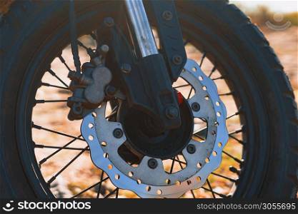 Old style spoked motorcycle wheel with disk brakes