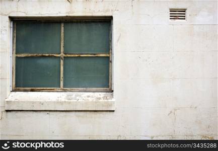 Old style window in concrete wall with copy space
