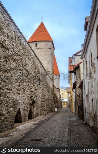 Old Tallinn town street with medieval towers, Estonia