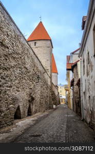 Old Tallinn town street with medieval towers, Estonia