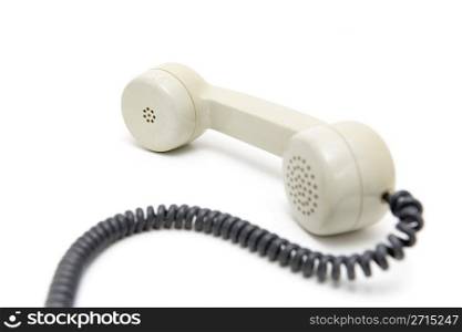 Old telephone on a white background