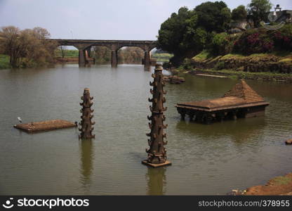 Old temple and deepmala, stone structure for lights, inside Panchganga river, Kolhapur, Maharashtra. Old temple and deepmala, stone structure for lights, inside Panchganga river, Kolhapur, Maharashtra.