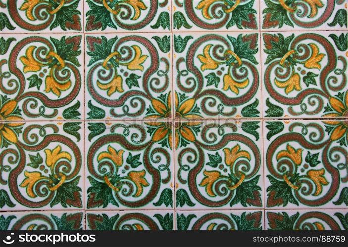 Old tiles detail abstract pattern, green and brown