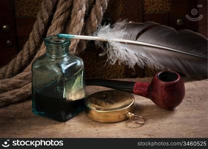 old tobacco pipe and inkwell, still life