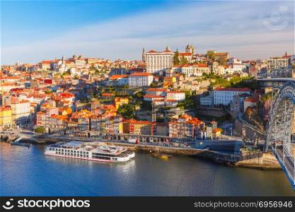 Old town and Douro river in Porto, Portugal.. Picturesque panoramic aerial view of Old town of Porto, Ribeira and Douro River in the morning, Portugal