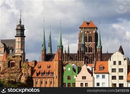 Old Town architecture with Church of the Blessed Virgin Mary (Polish: Bazylika Mariacka) in the background in Gdansk (Danzig), Poland