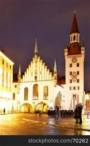 Old Town hall at Marienplatz in Munich at night, Germany. Retro style filtered image