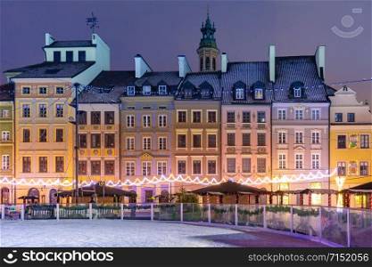 Old Town Market Place with colorful houses during morning blue hour, Warsaw, Poland.. Old Town Market Place in morning, Warsaw, Poland.