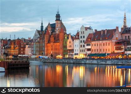 Old Town of Gdansk, Dlugie Pobrzeze and Motlawa River in night, Poland