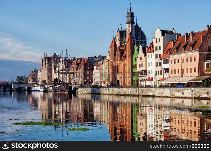 Old Town of Gdansk skyline in the morning by the Motlawa river in Poland.