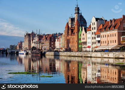 Old Town of Gdansk skyline in the morning by the Motlawa river in Poland.
