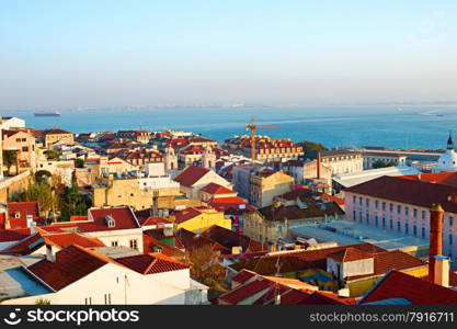 Old Town of Lisbon at sunset. Aerial view