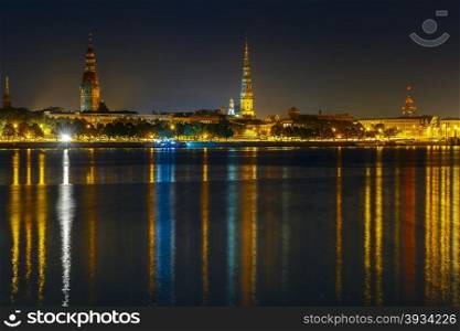 Old Town of Riga and River Daugava at night, Latvian Academy of Sciences, Riga Cathedral and Saint Peter church in the background, Latvia