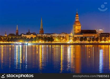 Old Town of Riga and River Daugava at night, Riga Cathedral, Cathedral Basilica of Saint James and Riga castle in the background, Latvia