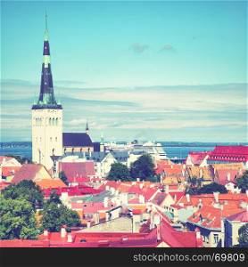 Old town of Tallin with St. Olaf's Church, Estonia. Retro style filtred image