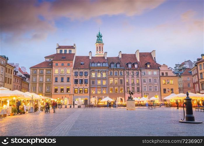 Old town square in Warsaw, Poland at sunset