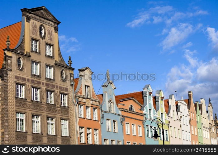 Old Town tenement houses residential architecture in the city of Gdansk, Poland, composition with copyspace