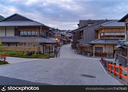Old town with Japanese houses in travel holidays vacation trip outdoors in Kyoto City, Japan. Tourist attraction at sunrise. Traditional architecture background.