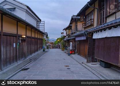 Old town with Japanese houses in travel holidays vacation trip outdoors in Kyoto City, Japan. Tourist attraction at sunrise. Traditional architecture background.