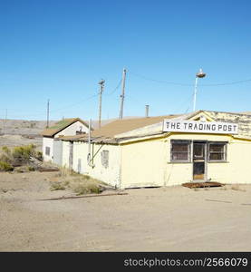 Old trading post in desert landscape of Utah.