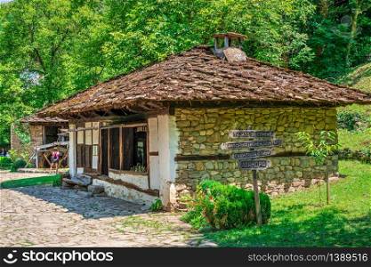 Old traditional house in the Etar Architectural Ethnographic Complex in Bulgaria on a sunny summer day. Etar Architectural Ethnographic Complex in Bulgaria