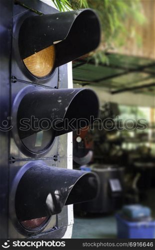 Old traffic light stand by weather, stock photo