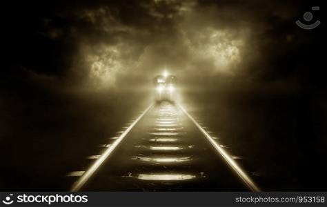 Old trains run through at night on sky cloud storm background