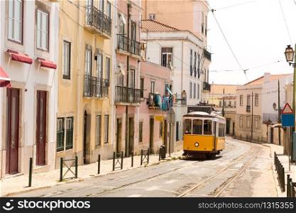 Old tram on narrow european street . Tram on the street