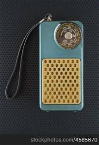 Old transistor radio on black background